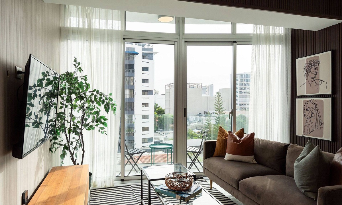Ensanche Quisqueya Apartment | 1BR Piantini King Suite Near Blue Mall, Pool & Sauna | YellowKey