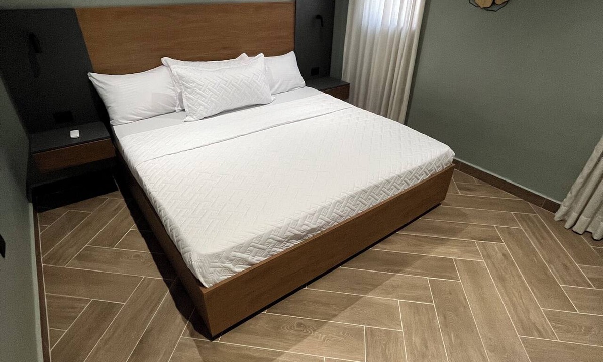 Higuey Apartment | Luxury Minimalist Suite with a Private Living Room and Kitchenette, near the squares.