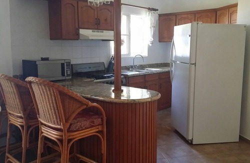 Urbanizacion Tavarez Villa | 4-BDR inexpensive guest-friendly villa with pool in central Sosua, ideal for men