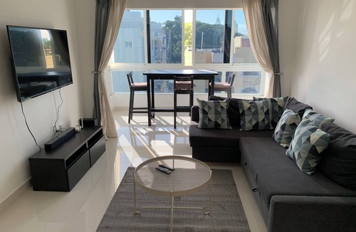 Santo Domingo Condo | 4-bedroom condo Steps from Ocean w/Pier, parking, WiFi, AC, parks & shopping.