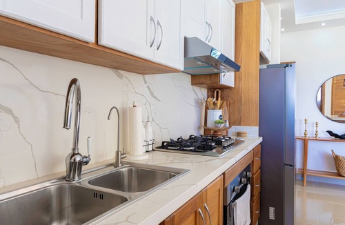 Cabrera Apartment | 5 min to the beach! Pristine ocean view apartment - Gated community with parking