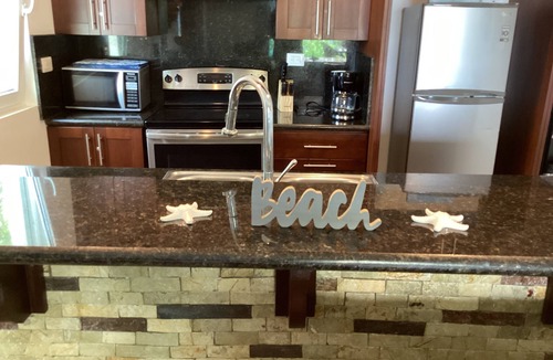 El Batey Condo | Beachfront Jr Penthouse *Amazing Views*1 min walk to Beach/Restaurants Elevator