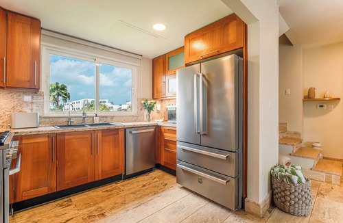 Las Terrenas Apartment | Beachfront Renovated-2-bedroom Apt. Rooftop covered outdoor kitchen and jacuzzi.