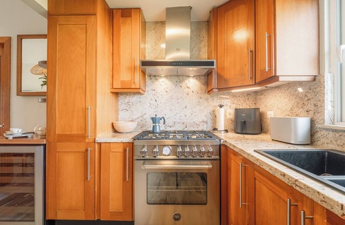 Las Terrenas Apartment | Beachfront Renovated-2-bedroom Apt. Rooftop covered outdoor kitchen and jacuzzi.