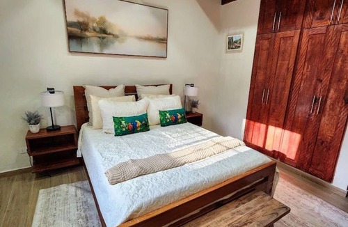 La Vega Province House | Bluebird Suite — Cozy double, mountain calm