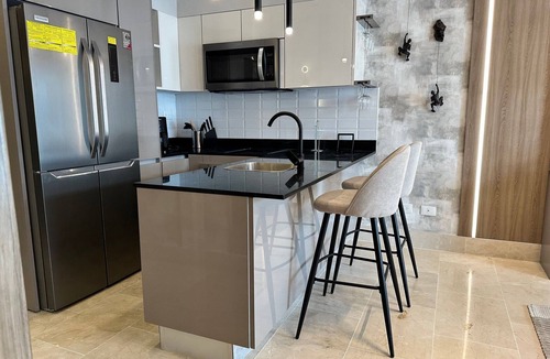 Lope De Vega Condo | Chic 1BR Serrallés Retreat, Rooftop Pool|YellowKey