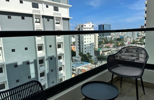 Lope De Vega Condo | Chic 1BR Serrallés Retreat, Rooftop Pool|YellowKey