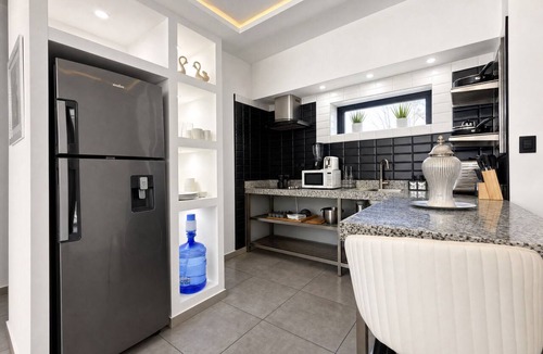 El Batey Apartment | Cozy 1-bedroom apartment in tranquil Sosúa with AC, Hot Water, Pool and GYM