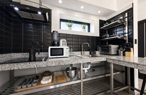 El Batey Apartment | Cozy 1-bedroom apartment in tranquil Sosúa with AC, Hot Water, Pool and GYM