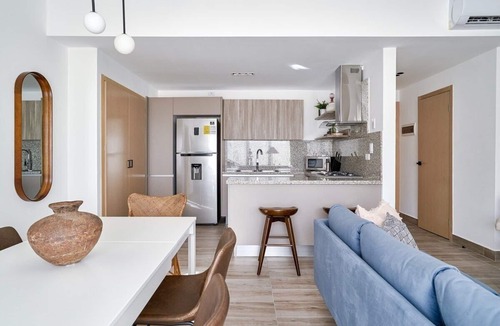 Downtown Santo Domingo Condo | Cozy 1BR near Blue Mall with pool and fast wifi in Piantini YellowKey