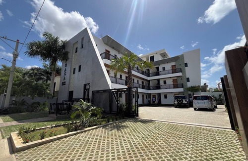 Higuey Apartment | Elegant 2-Room Centrica Suite with Private Parking S