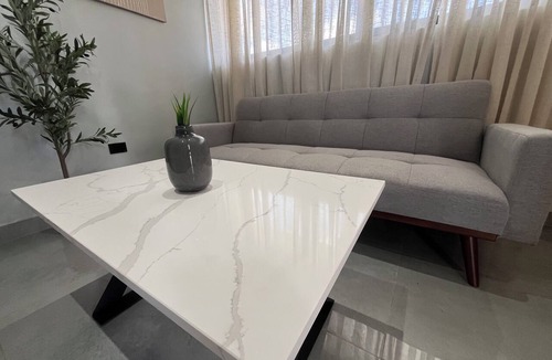Higuey Apartment | Elegant 2-Room Centrica Suite with Private Parking S