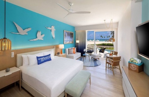 Punta Cana Hotel | Elegant Art Suite: Freestanding Tub, Rainforest Showers, and Premium Benefits