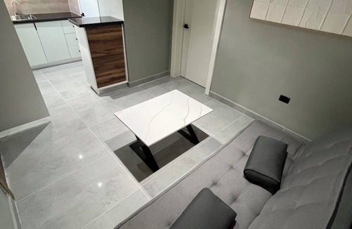 Higuey Apartment | Luxury Minimalist Suite with a Private Living Room and Kitchenette, near the squares.