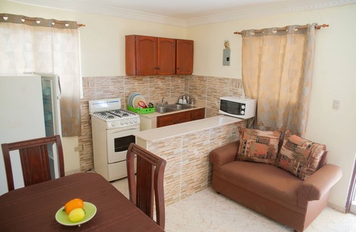 Corales del Sur Apartment | Modern 1-Bedroom Apartment with Private Balcony Fast Wi-Fi Free Parking