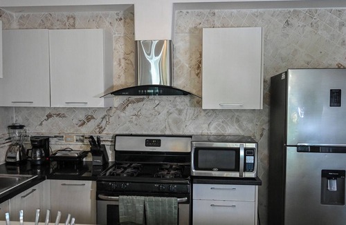 Playa Bibijagua House | Modern 2-Bedroom Apartment in Bibijagua | Enjoy the Beach Just Steps Away