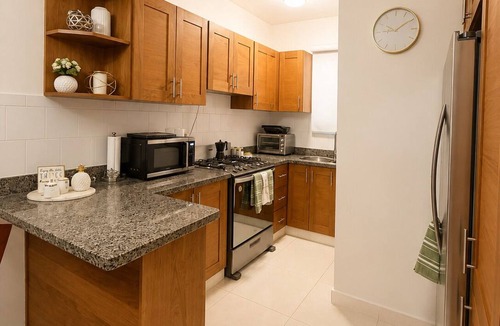 Llanos de Gurabo I Apartment | Modern 2BR Apartment with Balcony & AC in Santiago