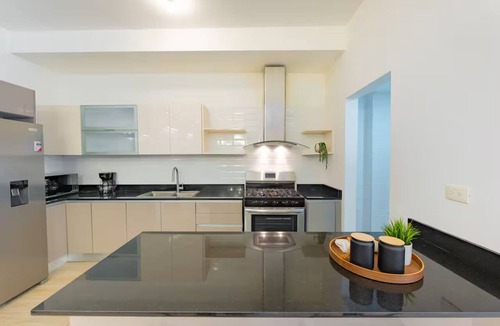 Lope De Vega Condo | Modern Piantini Stay Prime Location + Pool