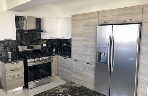 Downtown Santo Domingo Condo | TOP OF THE LINE APT IN PIANTINI WITH POOL & GYM