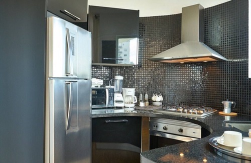 Downtown Santo Domingo House | Upscale 1BR apartment near Blue mall with rooftop by Yellowkey