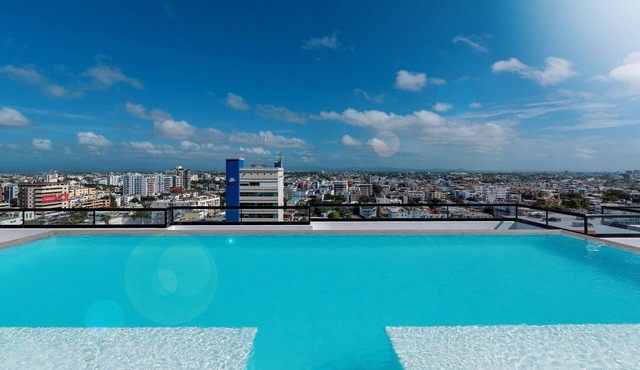 2-Bedroom Comfort with Rooftop Pool Views