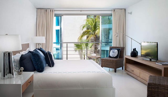 4BD groundfloor condo, pure beachfront, gym/pool/high-speed internet/cable TV in Sosúa