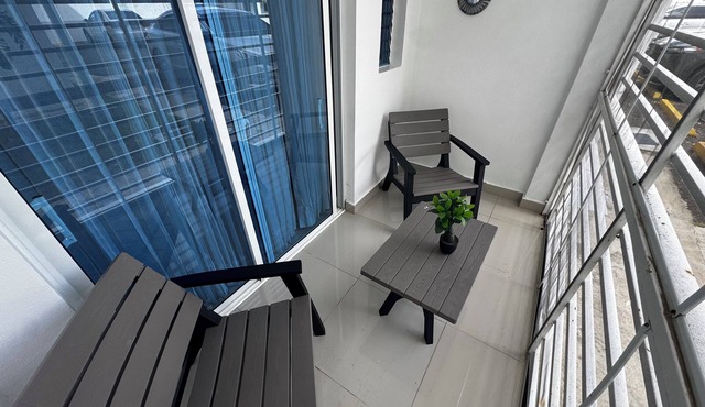 First floor 2-bedroom apartment with AC in vibrant Moca in Moca