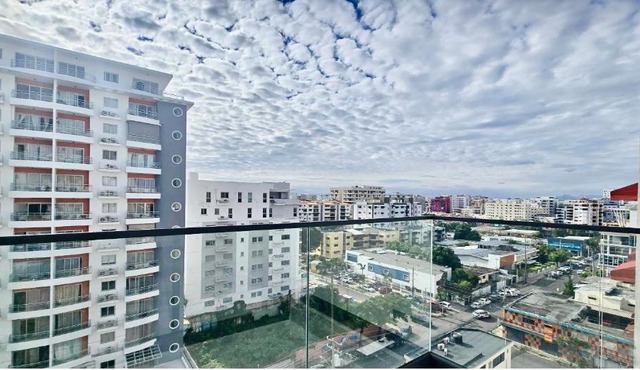 Luxury Suite with Workspace, Pool & City Views Near Piantini & Ave Churchill in Santo Domingo