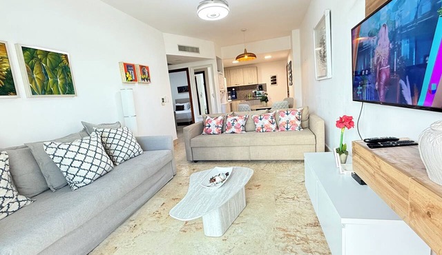 MAGNIFIQUE BEACHWALK CONDO IN NUEVA ROMANA RESORT in LA CANA