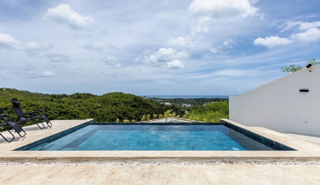 Wake Up Above the Clouds with Ocean & Mountain Views.