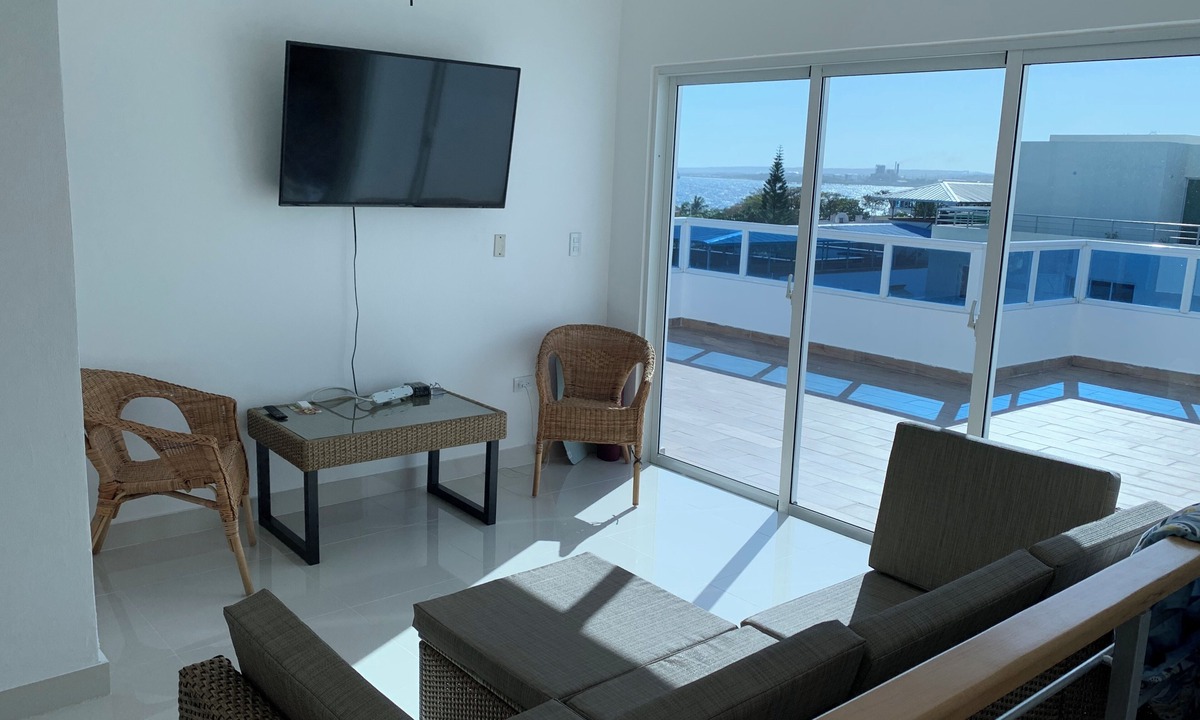 Santo Domingo Condo | 4-bedroom condo Steps from Ocean w/Pier, parking, WiFi, AC, parks & shopping.
