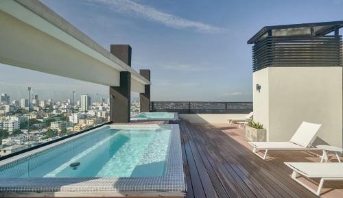 Four-Bedroom Apartment with Balcony 