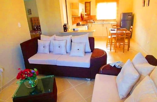 Bavaro Villa | Villa Sol Apartments in Punta cana with Panoramic View Pool lights at Night