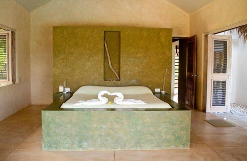 Las Terrenas Villa | Casa Cocoloba offers a splendid view of the sea and 4000 meters of parkland.