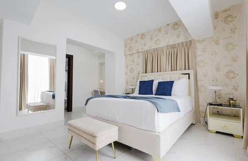 Lope De Vega Condo | Stylish, City Center Condo, Fast Wi-Fi, Full AC.
