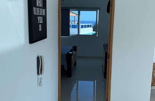 Santo Domingo Condo | 4-bedroom condo Steps from Ocean w/Pier, parking, WiFi, AC, parks & shopping.