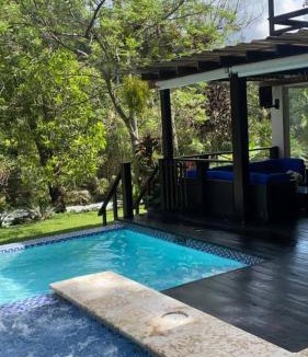 Manabao House | Michelle s Village River in front of Paradise