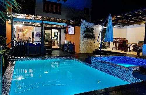 Manabao House | Michelle s Village River in front of Paradise