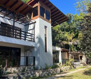 Manabao House | Michelle s Village River in front of Paradise