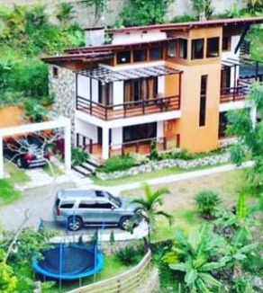 Manabao House | Michelle s Village River in front of Paradise