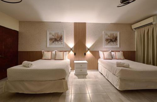 La Arboleda Hotel | Roy Arias Suites & Residences