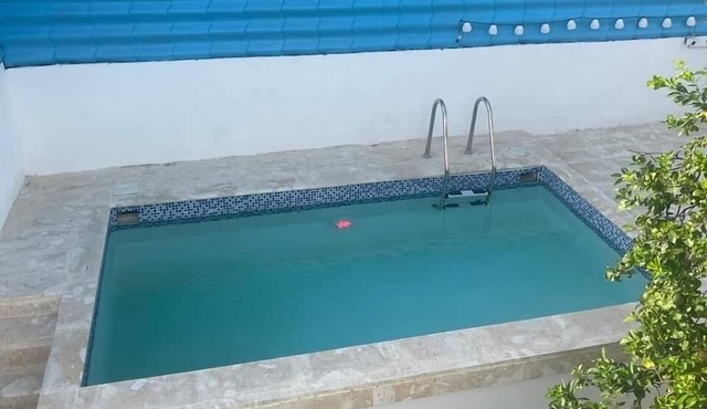 cozy home minutes from the beach family-friendly in Monte Cristi
